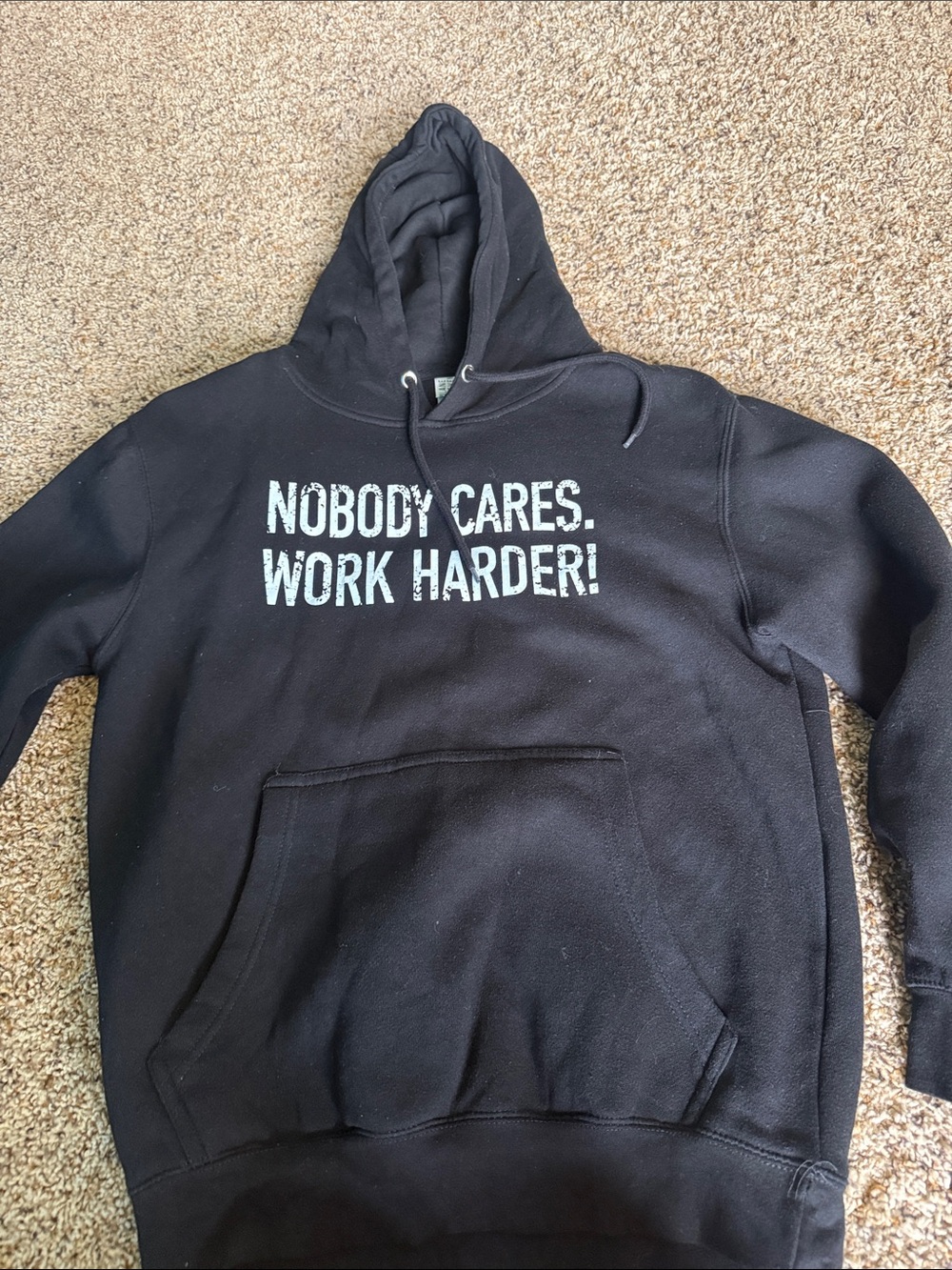 Black Hooded Pullover Sweatshirt with "Nobody Cares. Work Harder!" Print
